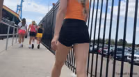 Orange top black shorts.MOV